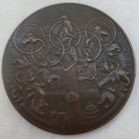 1956 Melbourne Participation Medal, in bronze, designed by Andor Mezaros, minted by KGLuke in Melbourne, 63mm diameter - Sold for $146 - 2015