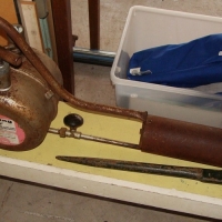 2 items - vintage flame thrower and long metal spanner - Sold for $30 - 2015
