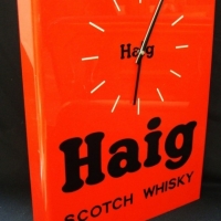 Group lot - Red plastic Haig Scotch Whisky clock & 2 brass and boxwood Rabone folding rulers - Sold for $55 - 2015