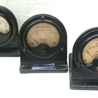 Group of industrial ampere gauges and wooden cased ampere meter - Sold for $49 - 2015
