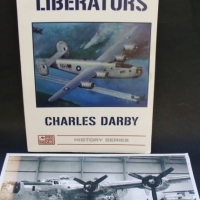 2 x items - Book - Australia's Liberators By Charles Darby with a photo of a liberator bomber - Sold for $73 - 2015