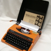 Vintage Orange portable typewriter by Ausroyal model 7200 - Sold for $37 - 2015