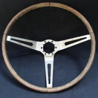 Vintage brown composite  Ford Steering wheel with chrome middle section - no marks sighted - Sold for $98 - 2015