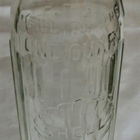 Vintage one quart Shell embossed oil bottle aprox - 36cm tall - Sold for $79 - 2015