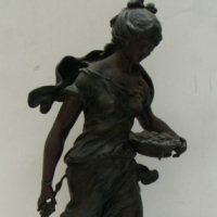 Large c1890 Moreau Spelter statue of a maiden bearing a basket of fruit  - plaque to front titled 'Premiers Fruits'  Approx 58cm H - af - Sold for $73 - 2015