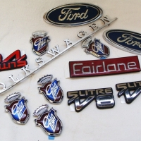 Group of Car badges including Volkswagen and ford - Sold for $30 - 2015