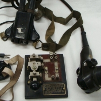 Grp lot WW2 Military electronic aviation equipment inc mouthpiece microphone, Eriksson ear piece and morse code set - Sold for $49 - 2015