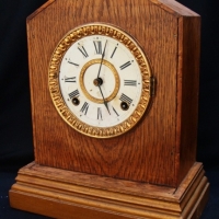 Oak Cased American Ansonia Mantle clock with 6 inch Roman numeral face - Sold for $73 - 2015
