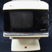 Retro Sharp white portable TV with original separate swivel stand - Sold for $98 - 2015