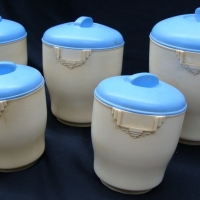 Set of Cream Bakelite canisters with Blue lids - Sold for $43 - 2015