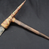 Papuan axe with diorite stone blade and painted carved finial - Sold for $67 - 2015