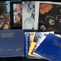 THE BEATLES Collection LP record box set - 13 records in as new condition, box with facsimile signatures - EMI records - Sold for $104 - 2015