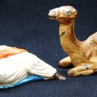 2 x 1930's vintage cold painted cast metal figures - Bedouin resting with pipe and camel, plus reclining Nubian - Sold for $79 - 2015