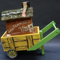 Vintage novelty Jim Beam San Francisco Flower Cart decanter with original wooden cart stand - Sold for $43 - 2015