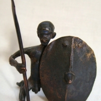 Vintage Bronze miniature African figure of a warrior with shield and spear - Sold for $30 - 2015