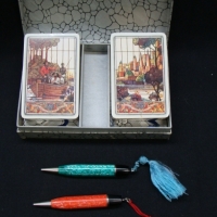 Mint boxed  twin pack of playing cards celebrating the Centenary of Melbourne 1935 inc 2 celluloid pencils - Sold for $49 - 2015