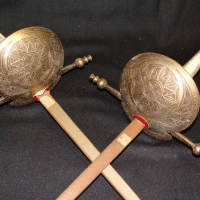 Pair c 1970s decorative wall swords - Sold for $55 - 2015