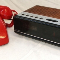 2 x Items incl - red rotary dial telephone & National Panasonic clock radio with plastic faux wood grain case - Sold for $55