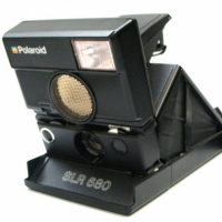 Polaroid SLR 680 folding camera - looks to be in good original condition - Sold for $24 - 2015