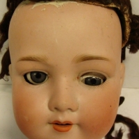 Large AM 390 bisque Doll's head with glass eyes - marked A 11 M - very fine hline crack above ear - Sold for $43 - 2015