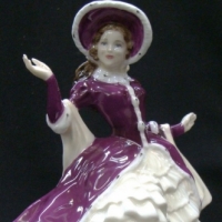 Royal Doulton Figurine -Christmas Day 2004 HN 4558, 22cm - Sold for $67 - 2015