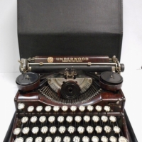 Lovely Vintage UNDERWOOD Standard Portable TYPEWRITER - c1930's in Black Case, Unusual BROWN FAUX TIMBER finish to body - Sold for $122 - 2015