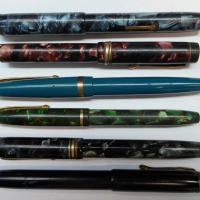6 x  Vintage fountain pens inc 5 x Conway Stewart, various cracked ice colours & Burnhams pink cracked ice - all with 14 ct gold nibs - Sold for $98 - 2015