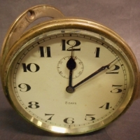 Vintage winding car clock with fold out mounting bracket - Sold for $98 - 2015