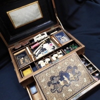 Early Victorian Chinese lacquer ware traveling writing sewing box in orig cond, incl heaps carved ivory sewing, embroidery  implements, cotton holders - Sold for $854 - 2015