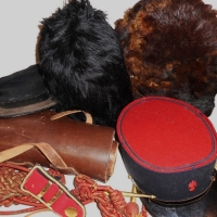 Box lot vintage military uniform items and accessories inc - braiding, gaits, tall fur hats, etc - Sold for $92 - 2015