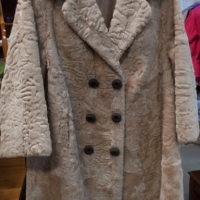 Vintage beige coloured double breasted Persian lamb fur coat with chocolate brown ornate corded buttons - Sold for $37 - 2015