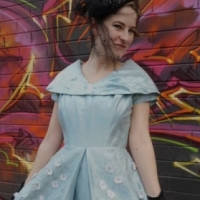 c 1950s ladies blue coloured shot silk cocktail frock with wide collar, embroidery and applied daisies to skirt - with original Margeaux label - Sold for $37 - 2015