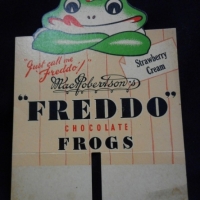 1930s MacRobertson's FREDDO chocolate frog POS card sign Strawberry Cream - featuring Freddo with Scottish hat - Sold for $1098 - 2015