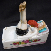 Victorian novelty china ashtray - reclining female figure with bobbing fan & legs (af) - Sold for $49 - 2015