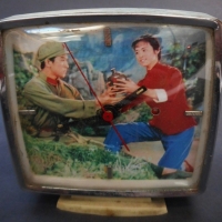 Vintage Chinese wind up alarm clock with kitsch image to face - Sold for $30 - 2015