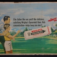 Vintage cardboard advertising sign for Wrigley's Chewing Gum - image of father & son - Sold for $195 - 2015