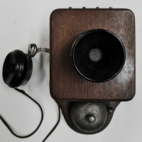 Vintage wall mounted extension phone with small Bakelite liftoff earpiece, marked British Made to back - Sold for $116 - 2015