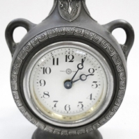 Vintage clock in pewter urn shaped case - Sold for $73 - 2015