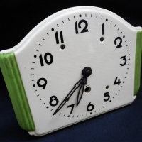 Circa 1950's china pendulum wall clock with cream ground & vertical green stepped bands to sides - Sold for $79 - 2015