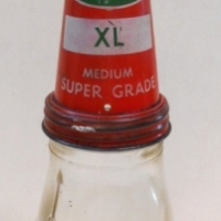 Vintage CASTROL oil bottle and spout - clear embossed bottle with red spout XL MEDIUM SUPER GRADE - Sold for $244 - 2015