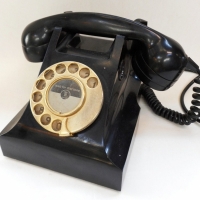 Vintage black Bakelite rotary dial telephone -Marked to base PMG AWA 61 - Sold for $61 - 2015