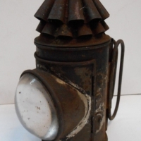 Small vintage metal workman's lamp with handles to back and magnifying glass shade - Sold for $85 - 2015