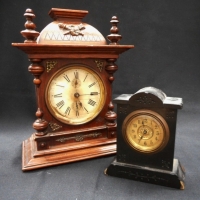 2 x vintage mantle clocks - small carved slate clock, plus carved wooden clock with gilt embellishment - Sold for $67 - 2015