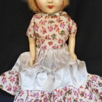 Circa 1940 Australian made TRIO SHURL doll with composition head, arms, legs & filled cloth body, sleep eyes, original wig - wearing vintage costume w - Sold for $49 - 2015