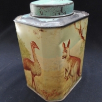Vintage Bushells 1 pound tea tin with embossed native animals - circa 1950s - Sold for $27 - 2015