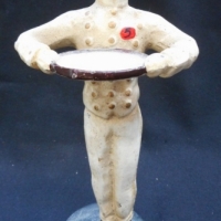 Cast iron waiter figurine - 21.5cm tall - Sold for $34 - 2015