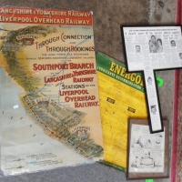 Group of ephemera including Lancashire and Yorkshire railways poster of Liverpool, Energol poster, and framed newspaper cutting - Sold for $37 - 2015