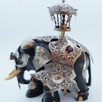 Vintage ebony ceremonial Elephant (made in Ceylon) wearing ornate silver Armour with 3 x semi precious stones - 11 cms H - Sold for $98 - 2015
