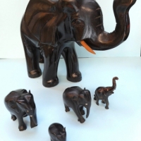 Approx  x mostly ebony style wooden elephants - assorted sizes - Sold for $37 - 2015