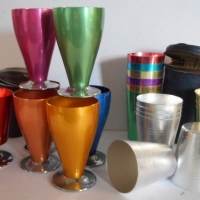 Group Lot Anodised cups inc- 2x sets in zip up travel cases and short stemmed cups - all in bright colours - Sold for $43 - 2015